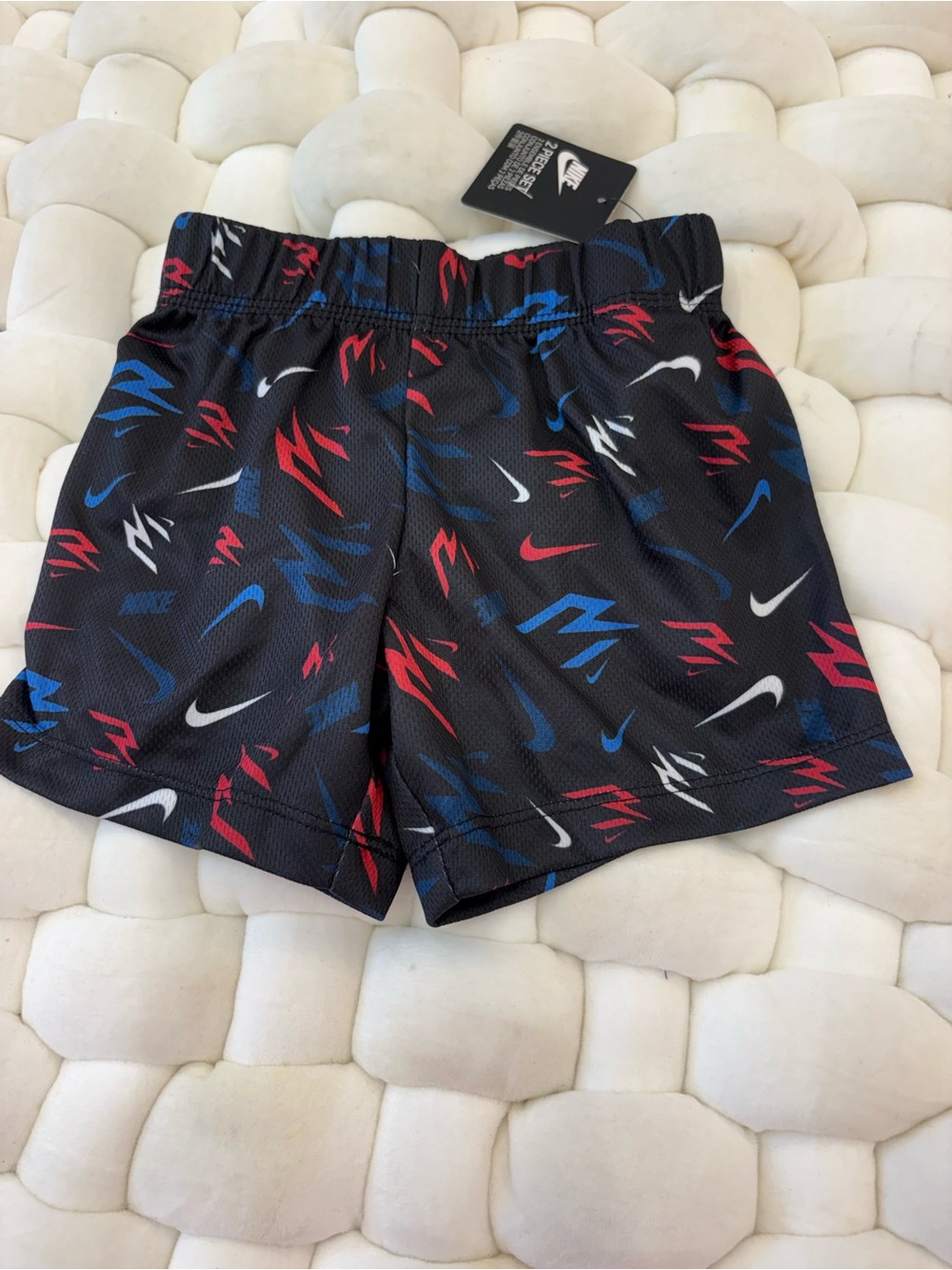 Nike Black Kids' Mesh Swim Shorts with Red, Blue & White Swoosh Print